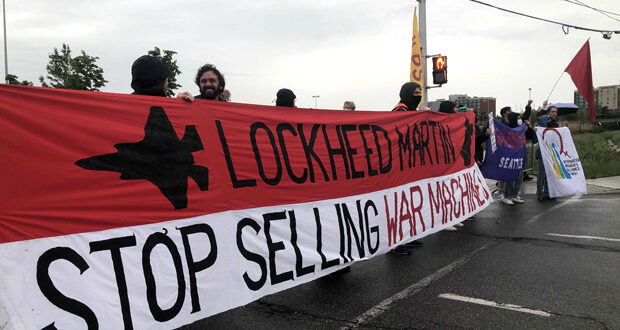 lockheed-martin-anti-war-banner-cansec-blockade-ottawa-peace-activists_0